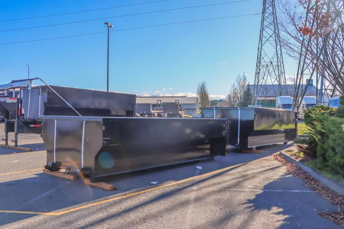 Roll-off dumpster ready for waste disposal at job site for 2 Yard Dumpster Rental in Winslow